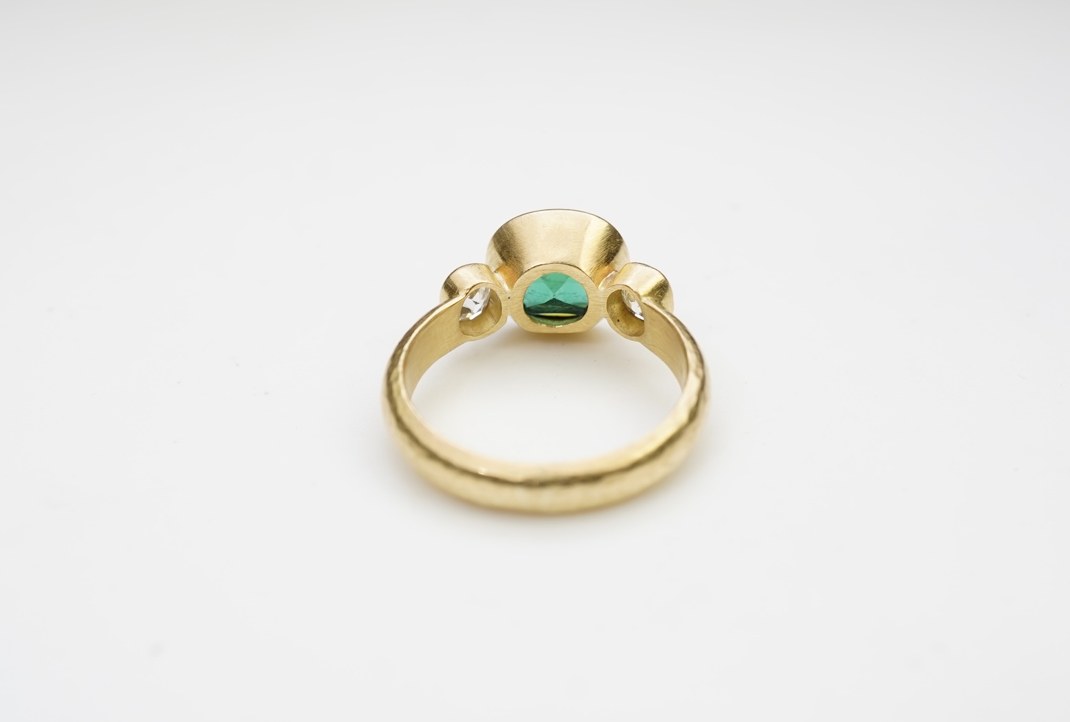 A green tourmaline and diamond ring